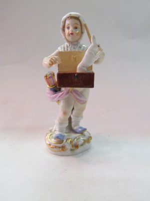 Porcelain Figure of a Cherub Magician