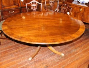 Old English Sheraton Style Rosewood Cross-banded Figured Solid Mahogany Circular Dining Table