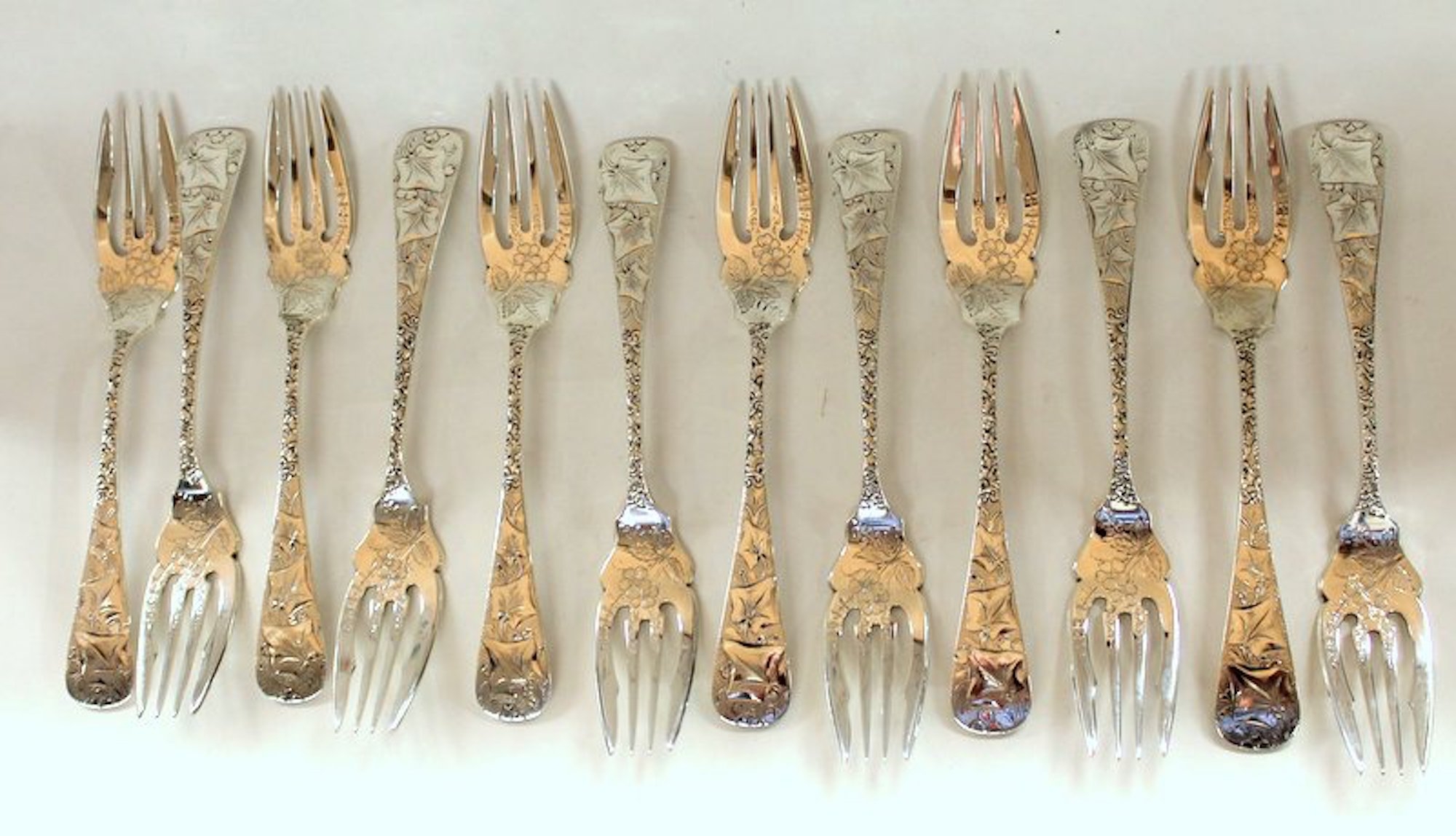 Set of 12 Exquisite Old American Sterling "Bright Cut" Hand Engraved Dessert Forks